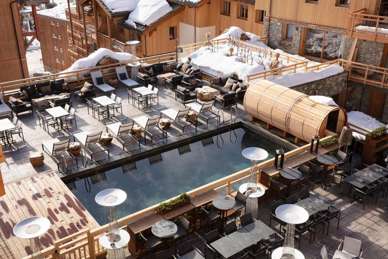 Grandes Rousses Hotel & Spa Alpe d'Huez Luaran gambar The outdoor pool at the Hotel de la Cour des Légendes