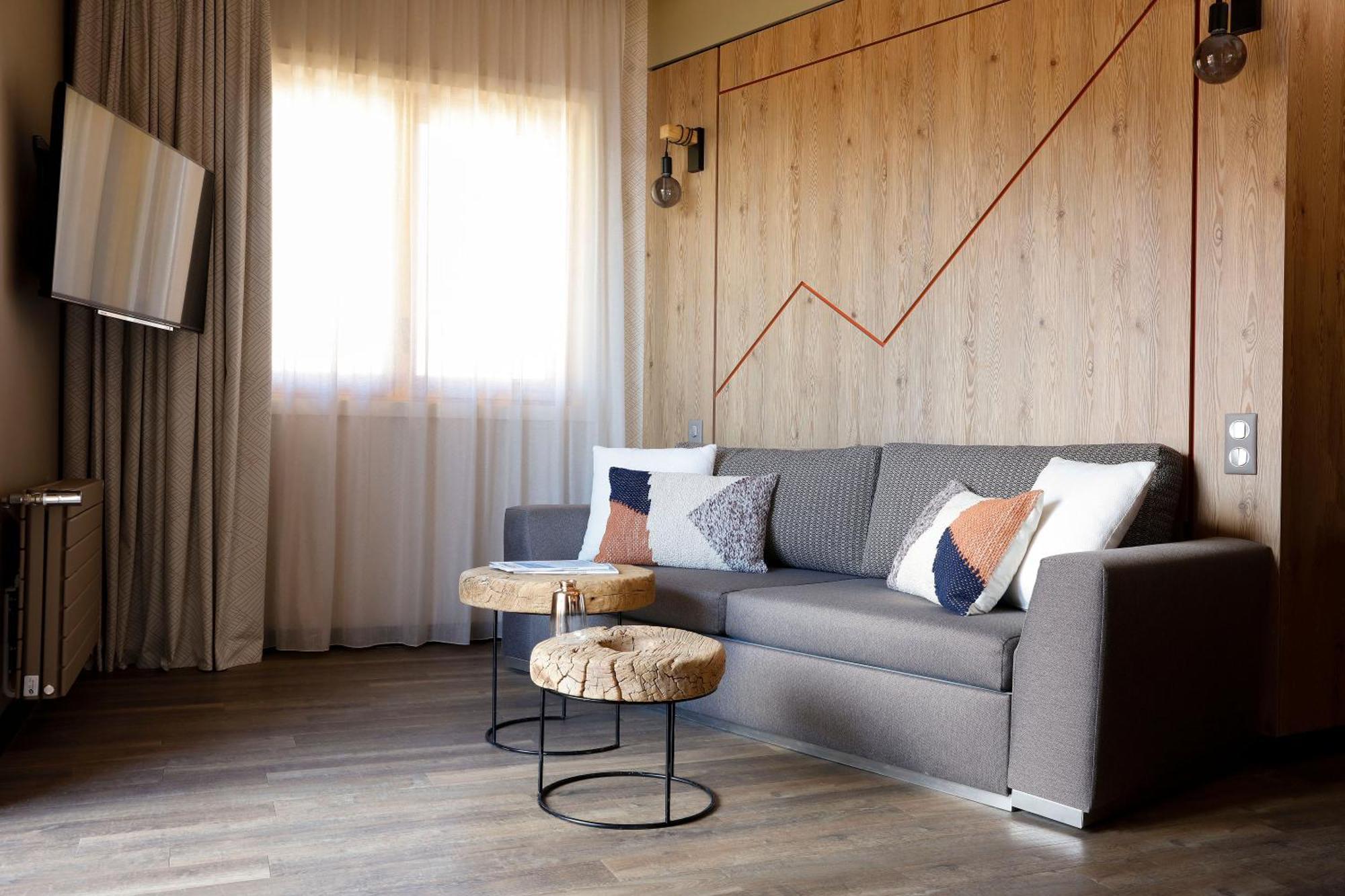 Grandes Rousses Hotel & Spa Alpe d'Huez Luaran gambar A living room in a hotel
